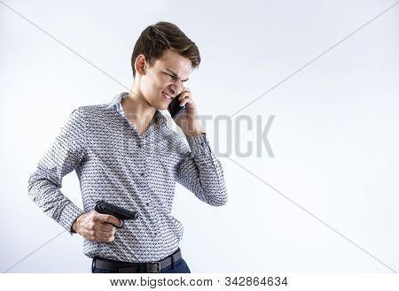 Young Man Broken Over Relationship. Young Man In Depression Commits A Foul Call. Copy Space