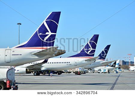 Warsaw,poland. 18 March 2018. Warsaw Chopin Airport. The Plane At The Airport On Loading. Plane Line