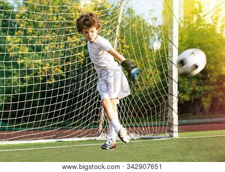 Childrens Soccer Football - A Match Of Young Children On The Football Field. Young Goalie. Kids - So