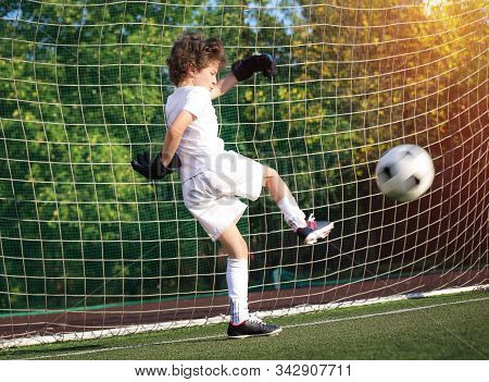 Childrens Soccer Football - A Match Of Young Children On The Football Field. Young Goalie. Kids - So