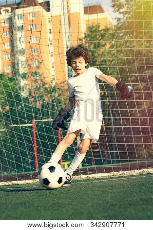 Childrens Soccer Football - A Match Of Young Children On The Football Field. Young Goalie. Kids - So