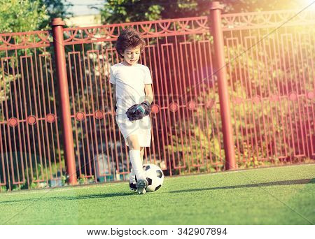 Childrens Soccer Football - A Match Of Young Children On The Football Field