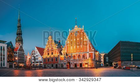 Riga, Latvia. Panorama Of Town Hall Square With St. Peters Church, Schwabe House, House Of Blackhead