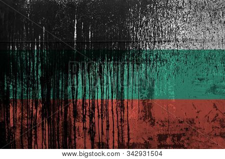 Bulgaria Flag Depicted In Paint Colors On Old And Dirty Oil Barrel Wall Closeup. Textured Banner On 
