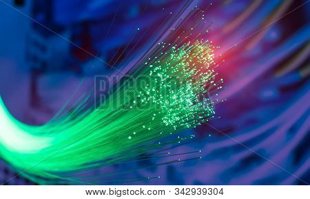 fiber optics network cable for ultra fast internet communications, thin light threads that move information at high speed.