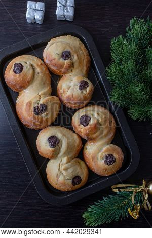 Swedish And Scandinavian Saffron Buns Lussekatter On A Table
