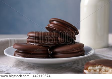 Tasty Choco Pies And Milk On White Wooden Table