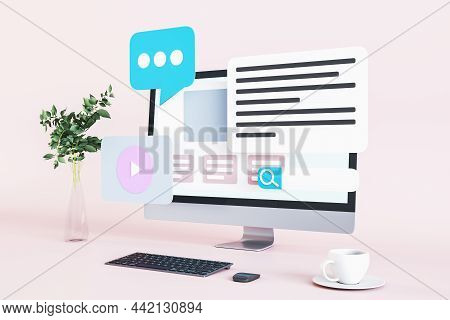 Close Up Of Creative Pink Designer Desk Top With Icons On Computer Monitor, Coffee Cup, Decorative P