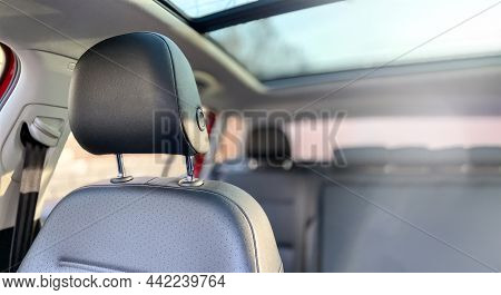 Close-up Of A Car Seat Headrest. Photography Of The Car Interior