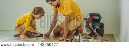 Banner, Long Format Father And Son Installing New Wooden Laminate Flooring On A Warm Film Floor. Inf