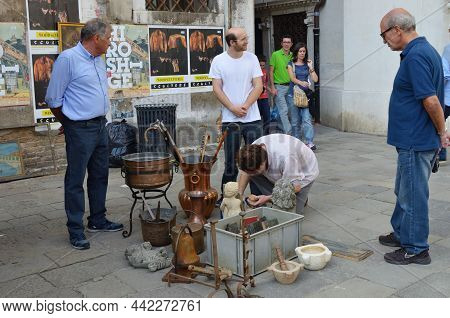 Venice, Italy - September 21, 2014:  Accessories, Toys, Painting, Arts, Etc For Sale At Venice Campo