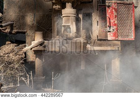 The Process Of Drilling Well With A Small-depth Drilling Rig. There Is A Lot Of Dust When Drilling A