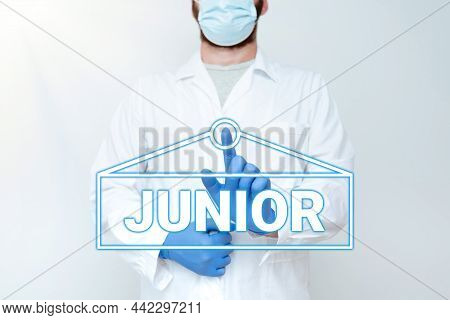 Handwriting Text Junior. Business Showcase Erson Who Is A Specified Number Of Years Younger Than Som