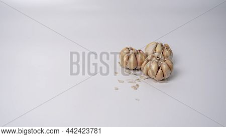 A Photo Of Garlic That Looks Like It Has Been Placed On A White Background. Garlic Is A Pungent Memb