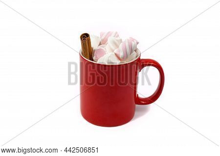 Red Cup With Marshmello And Cinnamon Stick Isolated On White Background