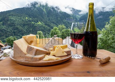 Cheese Collection, Wooden Board With French Cheeses Comte, Beaufort, Abondance, Emmental, Morbier An