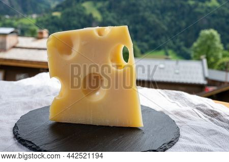 Cheese Collection, French Cow Cheese Emmental And French Mountains Village In Haute-savoie On Backgr