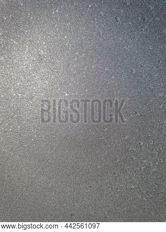 Frozen Ice Window Glass Looking Like Bright, Shiny Diamonds. Textured Icy Background In Flash Light