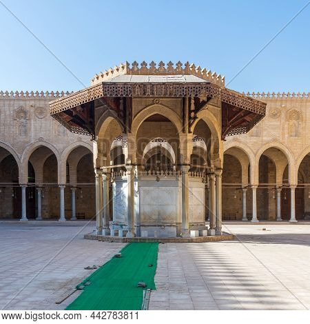 Ablution Fountain Mediating The Courtyard Of Public Historic Mosque Of Sultan Al Muayyad, With Backg