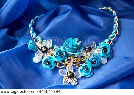 Beautiful Blue Beads. The Concept Of A Beautiful, Elegant Life And Beautiful Decoration For Woman