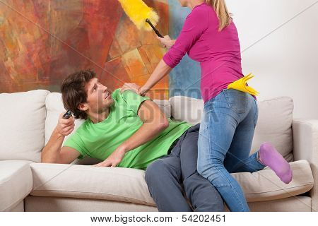 Woman Trying To Clean The Hosue