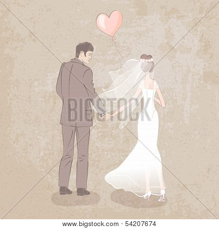 bride and groom with balloon