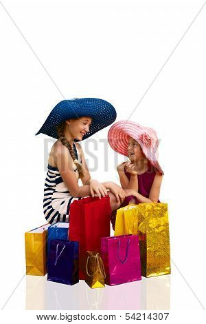 Two attractive happy girls out shopping