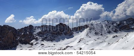 Panorama Of Snow Mountains In Sunny Day