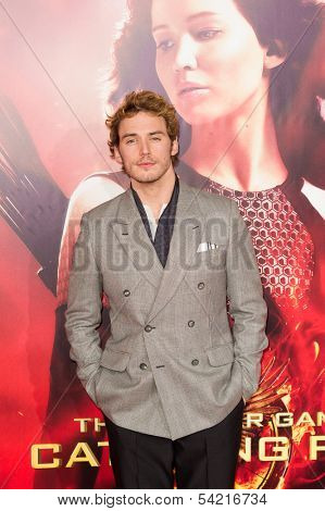 LOS ANGELES, CA - NOVEMBER 18: Actor Sam Claflin arrives at the premiere of The Hunger Games: Catching Fire at the Nokia Theater in Los Angeles, CA on November 18, 2013