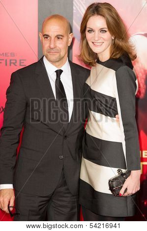 LOS ANGELES, CA - NOVEMBER 18: Actor Stanley Tucci arrives at the premiere of The Hunger Games: Catching Fire at the Nokia Theater in Los Angeles, CA on November 18, 2013