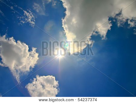 Sky With Clouds And Sun