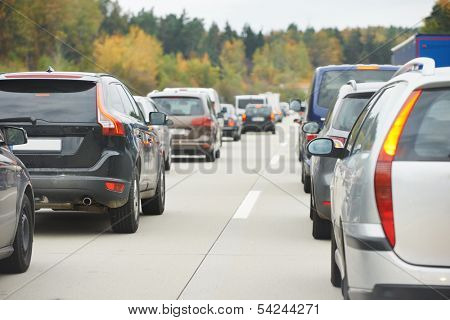 cars in traffic jam in a highway during rush hour
