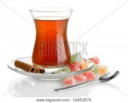 glass of Turkish tea and rahat Delight, isolated on white