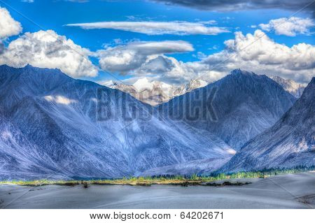 High dynamic range image valley in Himalayas. with sand dunes. Hunder, Nubra valley, Ladakh, India