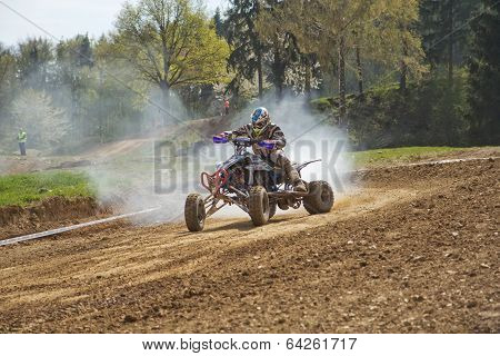 Quad Racer With Smoke From The Engine