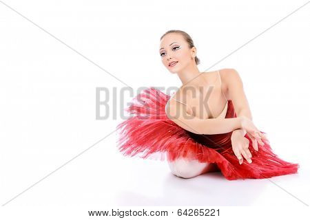 Professional bellet dancer posing at studio. Isolated over white background. 