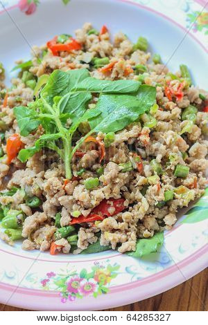 Rice topped with stir-fried pork and basil