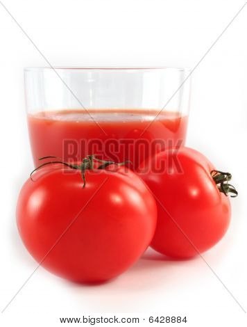 Tomatoes And A Glass Of Tomato Juice Isolated