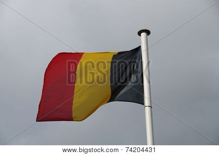 Belgian national flag blowing in the wind
