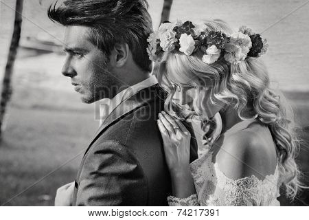 Young newly married couple posing 