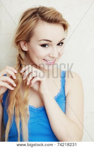 Hairstyle. Blond Woman Teenage Girl Plaiting Braid Hair.