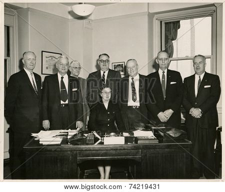 USA- CIRCA 1950s: Vintage photo shows group portrait offfice staff.  