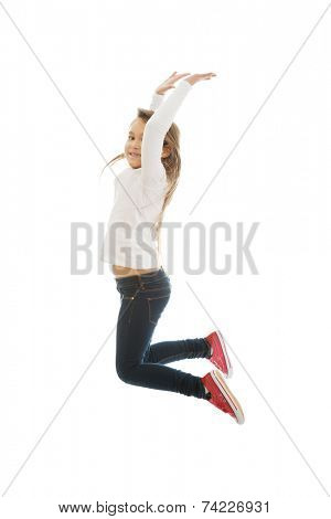 Little pretty girl jumping with joy