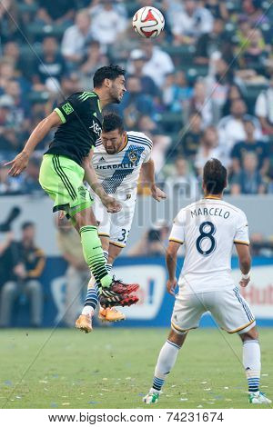 CARSON, CA - OCT 19: Lamar Neagle & Dan Gargan (back) in action during the Los Angeles Galaxy MLS game against the Seattle Sounders on October 19th 2014 at the StubHub Center.