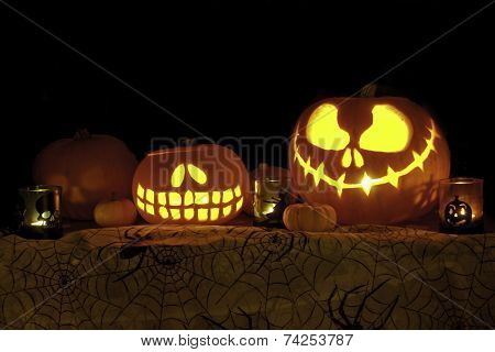 Jack o Lantern Pumpkins on Cobweb Fabric