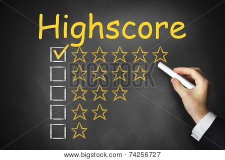Hand Writing Highscore On Black Chalkboard Rating
