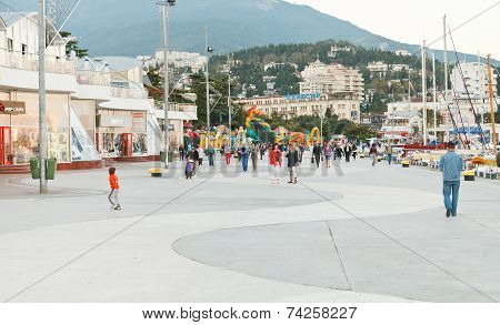 People On Promenade In Yalta City In Evening