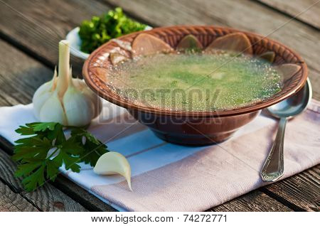 Delicious Fresh Soup On Wodeen Background