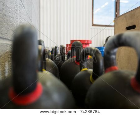 Selective focus of kettlebells at cross fitness box