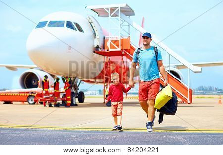 Happy Father And Son After Having A Trip On Airplane